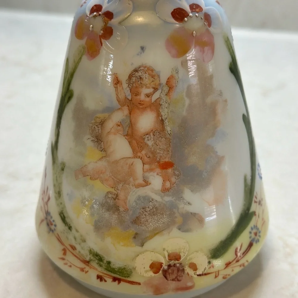 ANTIQUE BARBER SHOP BOTTLE WITH ATTRACTIVE CHERUB PICTURED ON FRONT SIDE.